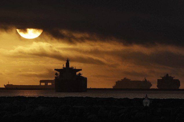 Anchored container ships and with other vessels sit offshore near the ports of Los Angeles and Long Beach during a strike
