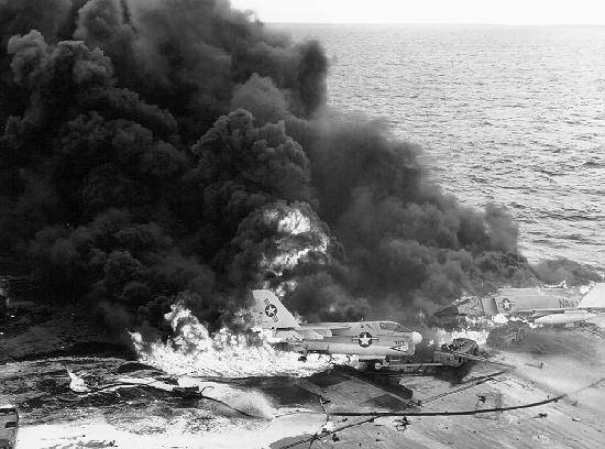 Aircraft_burning_on_USS_Enterprise_(CVN-65) aircraft fire zuni rocket uss enterprise vietnam war