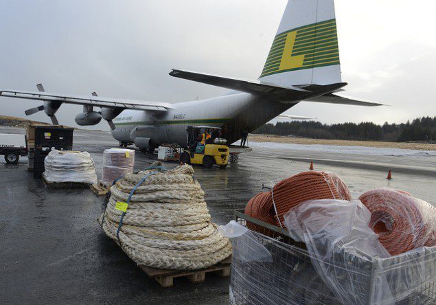Workers prepare equipment and supplies on the airport tarmac in Kodiak Thursday, Jan. 4 to be used in the ongoing Kulluk response and recovery effort. Photo by Greg Martin via KullukResponse.com