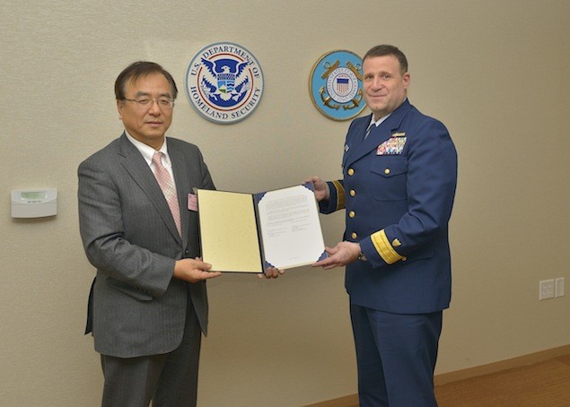 ClassNK Executive Vice President Dr. Takuya Yoneya receives a copy of the Recognized Organization Agreement from U.S. Coast Guard Rear Admiral Joseph A. Servidio while at USCG headquarters in Washington, D.C. on January 7, 2013. Photo: ClassNK