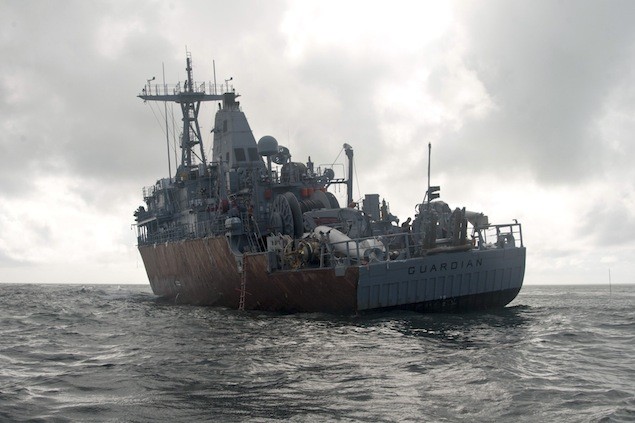 SULU SEA (Feb. 8, 2013) The mine countermeasures ship USS Guardian (MCM 5) sits aground on Tubbataha Reef, a UNESCO World Heritage site. U.S. Navy Photo