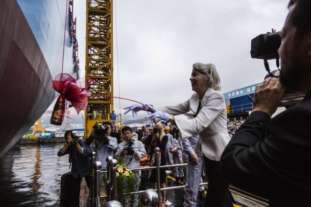 Ane Mærsk Mc-Kinney Uggla breaks a bottle against the vessels hull during the official naming ceremony. Image courtesy Maersk Line