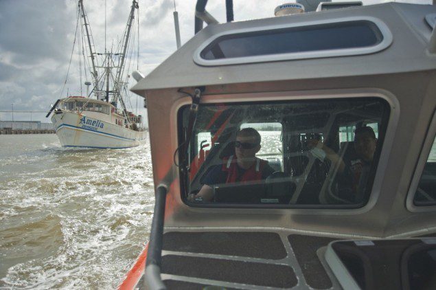 A boat crew from Coast Guard Station South Padre Island, Texas, escorts Mexican shrimp boats leaving the port of Brownsville after seeking shelter from Hurricane Ingrid. U.S. Coast Guard photo. 0 - See more at: http://coastguard.dodlive.mil/2013/10/safe-haven-from-hurricane-ingrid/1026746-1024x681/#sthash.uiYrgGvi.dpuf